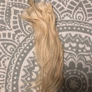 Blonde tape-in hair extensions